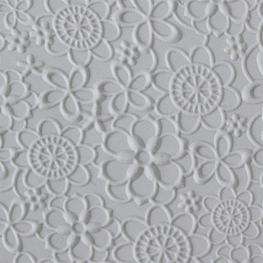 Texture Tile - Floral Web Embossed sample rolled into clay