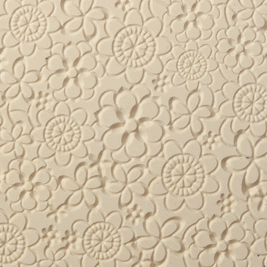 Texture Tile - Floral Web Embossed. Beige Texture Tiles are flexible, washable and can be used with any soft clay. Spritz with CoolSlip or dust on Dry Powder Release for stick-free impressions when using metal clay and polymer clay.