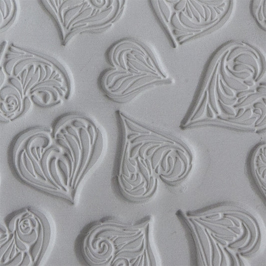 Texture Tile - Heartbreaker sample rolled into clay