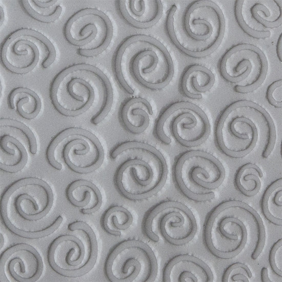 Texture Tile - Spirals sample rolled into clay