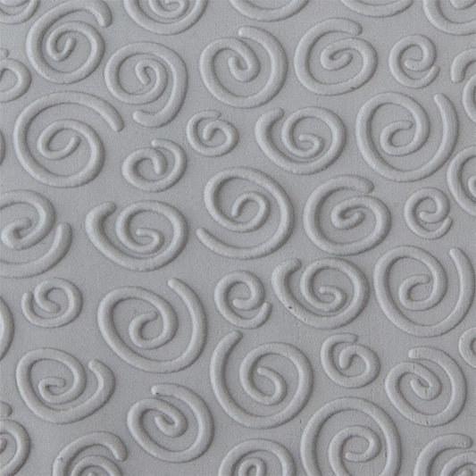 Texture Tile - Spirals Embossed sample rolled into clay