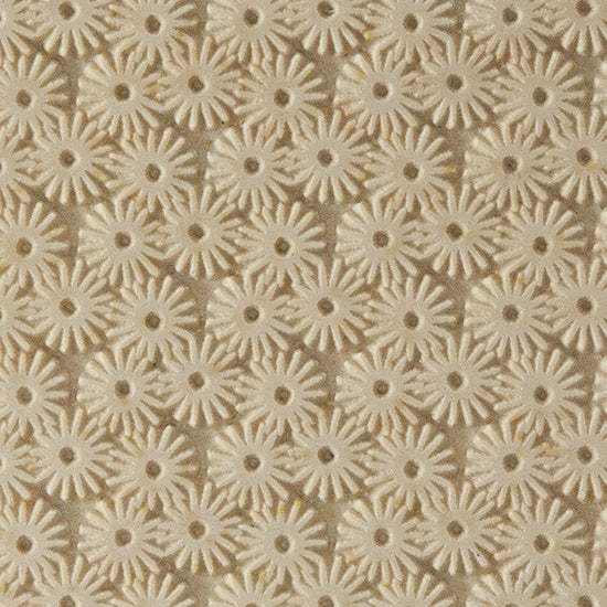 Texture Tile - Starburst. Beige Texture Tiles are flexible, washable and can be used with any soft clay. Spritz with CoolSlip or dust on Dry Powder Release for stick-free impressions when using metal clay and polymer clay.