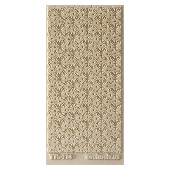 Texture Tile - Starburst. Beige Texture Tiles are flexible, washable and can be used with any soft clay. Spritz with CoolSlip or dust on Dry Powder Release for stick-free impressions when using metal clay and polymer clay.