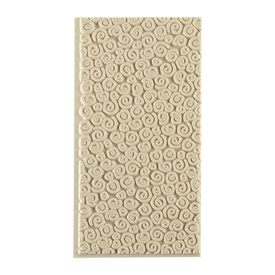 Texture Tile - Spirals Mini. Beige Texture Tiles are flexible, washable and can be used with any soft clay. Spritz with CoolSlip or dust on Dry Powder Release for stick-free impressions when using metal clay and polymer clay.