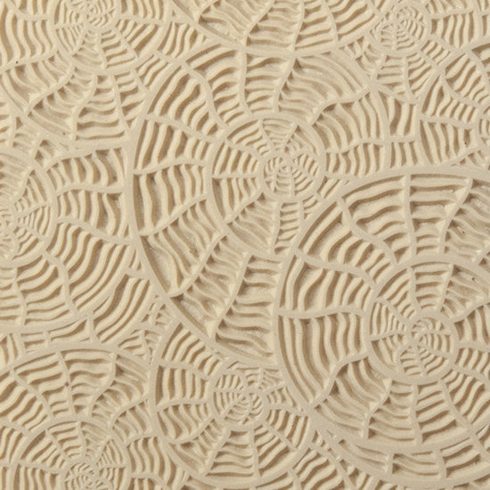 Texture Tile - Nautilus. Beige Texture Tiles are flexible, washable and can be used with any soft clay. Spritz with CoolSlip or dust on Dry Powder Release for stick-free impressions when using metal clay and polymer clay.