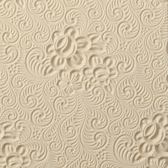 Texture Tile - Roses and Swirls. Beige Texture Tiles are flexible, washable and can be used with any soft clay. Spritz with CoolSlip or dust on Dry Powder Release for stick-free impressions when using metal clay and polymer clay.