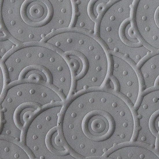 Texture Tile - Random Rivet Embossed sample rolled into clay