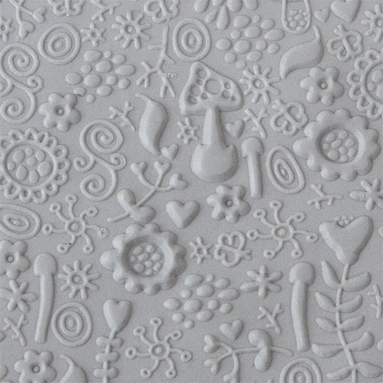 Texture Tile - Fairy Tale Embossed sample rolled into clay