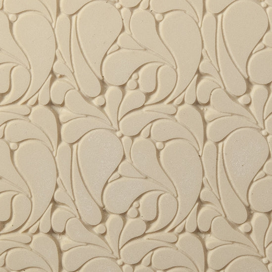 Texture Tile - Splash. Beige Texture Tiles are flexible, washable and can be used with any soft clay. Spritz with CoolSlip or dust on Dry Powder Release for stick-free impressions when using metal clay and polymer clay.