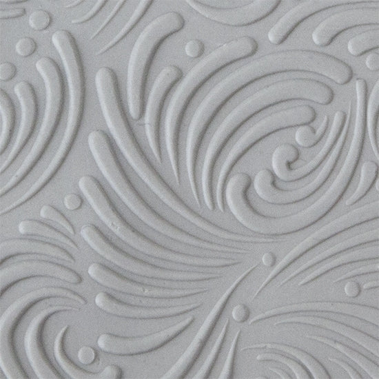 Texture Tile - Swirly Gig Embossed sample rolled into clay