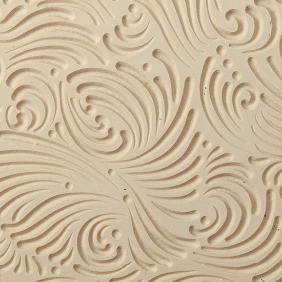 Texture Tile - Swirly Gig Embossed. Beige Texture Tiles are flexible, washable and can be used with any soft clay. Spritz with CoolSlip or dust on Dry Powder Release for stick-free impressions when using metal clay and polymer clay.