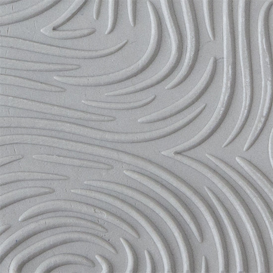 Texture Tile - Thumb Print Embossed sample rolled into clay