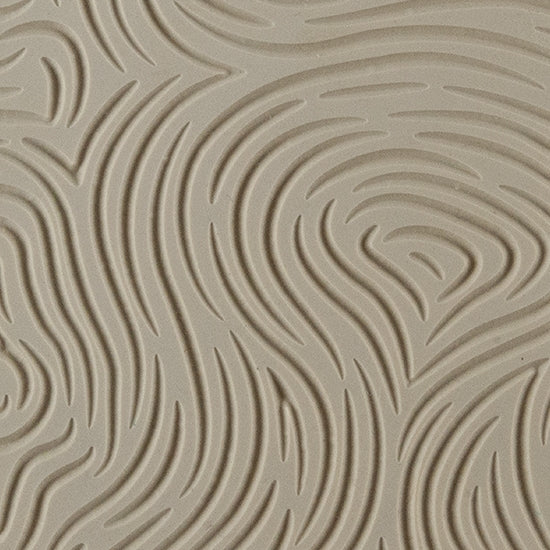 Texture Tile - Thumb Print Embossed. Beige Texture Tiles are flexible, washable and can be used with any soft clay. Spritz with CoolSlip or dust on Dry Powder Release for stick-free impressions when using metal clay and polymer clay.