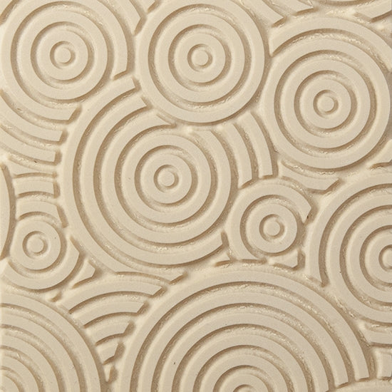 Texture Tile - Deco Circles. Beige Texture Tiles are flexible, washable and can be used with any soft clay. Spritz with CoolSlip or dust on Dry Powder Release for stick-free impressions when using metal clay and polymer clay.