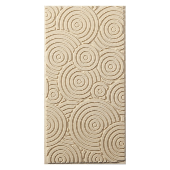 Texture Tile - Deco Circles. Beige Texture Tiles are flexible, washable and can be used with any soft clay. Spritz with CoolSlip or dust on Dry Powder Release for stick-free impressions when using metal clay and polymer clay.