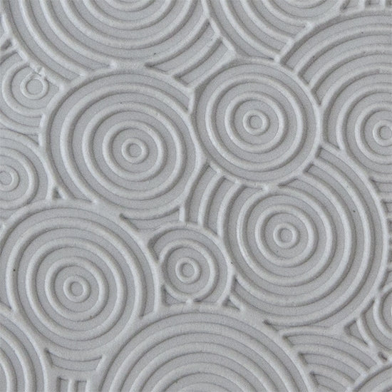 Texture Tile - Deco Circles Mini sample rolled into clay