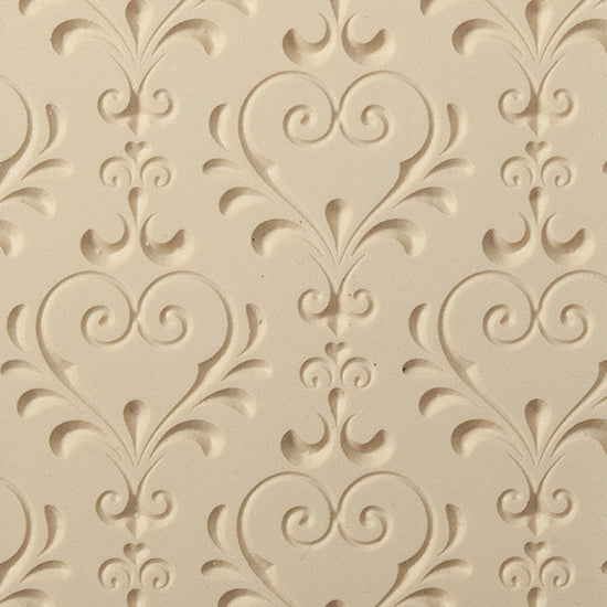 Texture Tile - My Sweetheart Embossed. Beige Texture Tiles are flexible, washable and can be used with any soft clay. Spritz with CoolSlip or dust on Dry Powder Release for stick-free impressions when using metal clay and polymer clay.