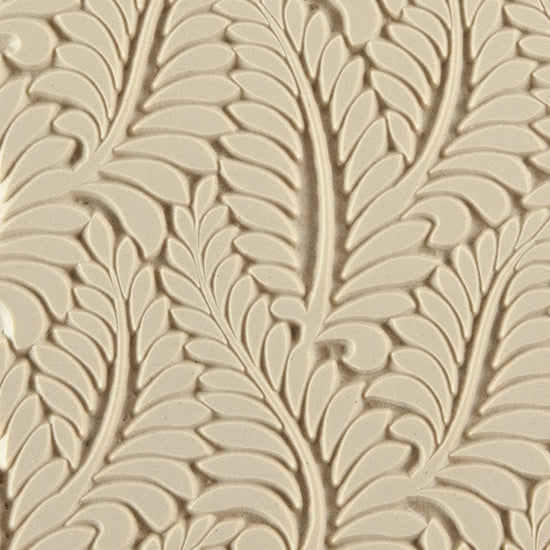 Texture Tile - Crown Fern. Beige Texture Tiles are flexible, washable and can be used with any soft clay. Spritz with CoolSlip or dust on Dry Powder Release for stick-free impressions when using metal clay and polymer clay.