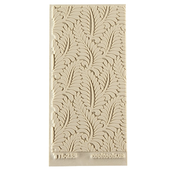 Texture Tile - Crown Fern. Beige Texture Tiles are flexible, washable and can be used with any soft clay. Spritz with CoolSlip or dust on Dry Powder Release for stick-free impressions when using metal clay and polymer clay.