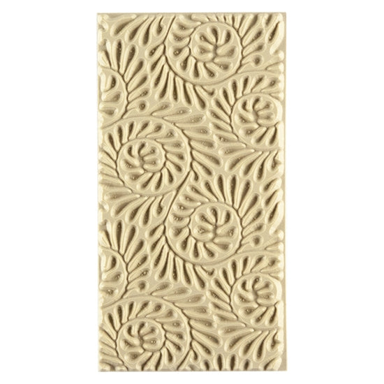 Texture Tile - Fiddlehead Fern Embossed. Beige Texture Tiles are flexible, washable and can be used with any soft clay. Spritz with CoolSlip or dust on Dry Powder Release for stick-free impressions when using metal clay and polymer clay.