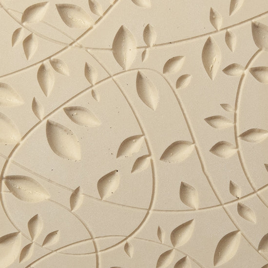 Texture Tile - Over Growth Embossed. Beige Texture Tiles are flexible, washable and can be used with any soft clay. Spritz with CoolSlip or dust on Dry Powder Release for stick-free impressions when using metal clay and polymer clay.