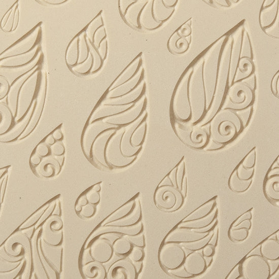 Texture Tile - Rainy Day Embossed. Beige Texture Tiles are flexible, washable and can be used with any soft clay. Spritz with CoolSlip or dust on Dry Powder Release for stick-free impressions when using metal clay and polymer clay.