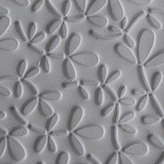 Texture Tile - Leafy Vine sample rolled into clay