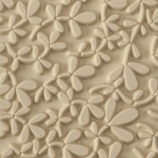 Texture Tile - Leafy Vine. Beige Texture Tiles are flexible, washable and can be used with any soft clay. Spritz with CoolSlip or dust on Dry Powder Release for stick-free impressions when using metal clay and polymer clay.