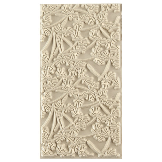 Texture Tile - Dandelion Wish. Beige Texture Tiles are flexible, washable and can be used with any soft clay. Spritz with CoolSlip or dust on Dry Powder Release for stick-free impressions when using metal clay and polymer clay.