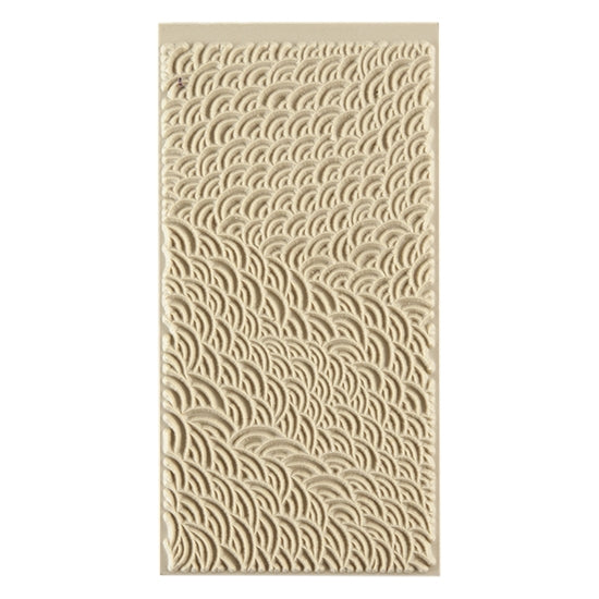 Texture Tile - Scaled. Beige Texture Tiles are flexible, washable and can be used with any soft clay. Spritz with CoolSlip or dust on Dry Powder Release for stick-free impressions when using metal clay and polymer clay.