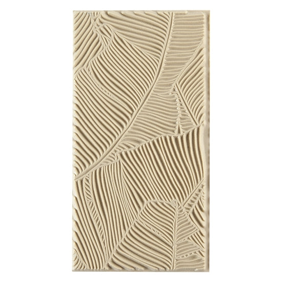 Texture Tile - Jungle Leaves. Beige Texture Tiles are flexible, washable and can be used with any soft clay. Spritz with CoolSlip or dust on Dry Powder Release for stick-free impressions when using metal clay and polymer clay.