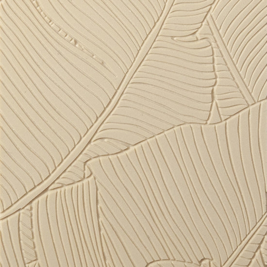 Texture Tile - Jungle Leaves Fineline. Beige Texture Tiles are flexible, washable and can be used with any soft clay. Spritz with CoolSlip or dust on Dry Powder Release for stick-free impressions when using metal clay and polymer clay.