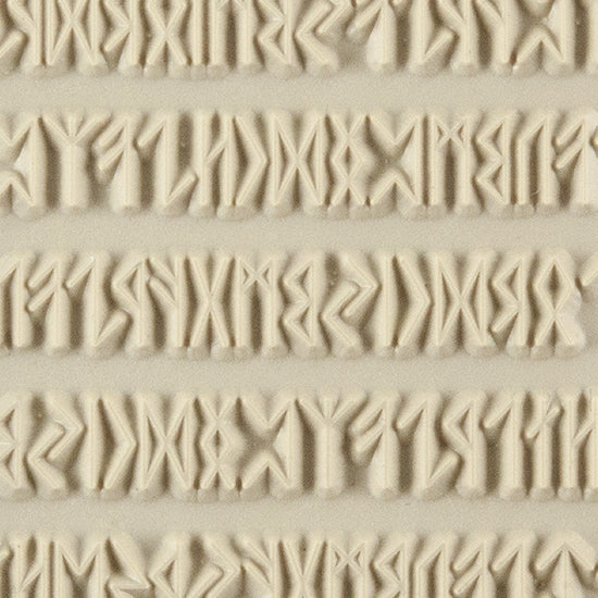 Texture Tile - Cave Writing. Beige Texture Tiles are flexible, washable and can be used with any soft clay. Spritz with CoolSlip or dust on Dry Powder Release for stick-free impressions when using metal clay and polymer clay.