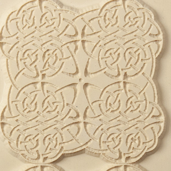 Texture Tile - Celtic Knots. Beige Texture Tiles are flexible, washable and can be used with any soft clay. Spritz with CoolSlip or dust on Dry Powder Release for stick-free impressions when using metal clay and polymer clay.