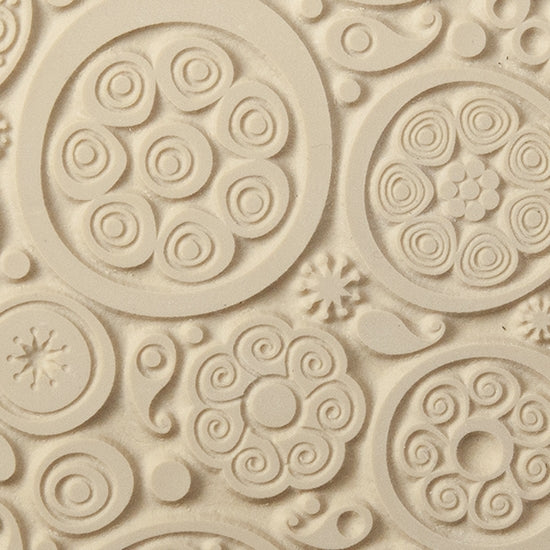 Texture Tile - Astro. Beige Texture Tiles are flexible, washable and can be used with any soft clay. Spritz with CoolSlip or dust on Dry Powder Release for stick-free impressions when using metal clay and polymer clay.