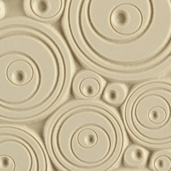 Texture Tile - Out of Sight. Beige Texture Tiles are flexible, washable and can be used with any soft clay. Spritz with CoolSlip or dust on Dry Powder Release for stick-free impressions when using metal clay and polymer clay.