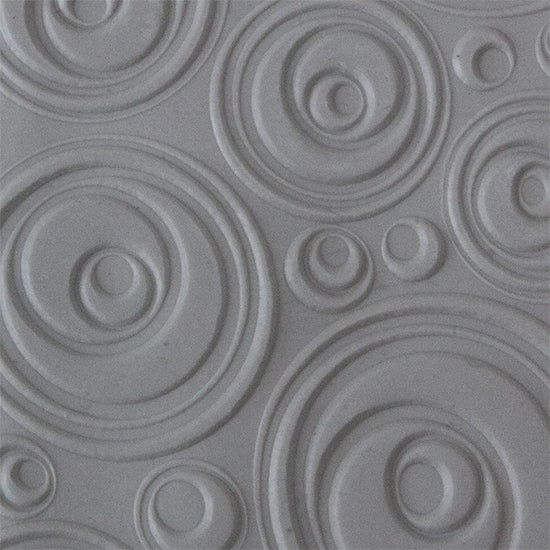 Texture Tile - Out of Sight Embossed sample rolled into clay