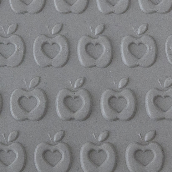 Texture Tile - The Heart is the Core Embossed sample rolled into clay