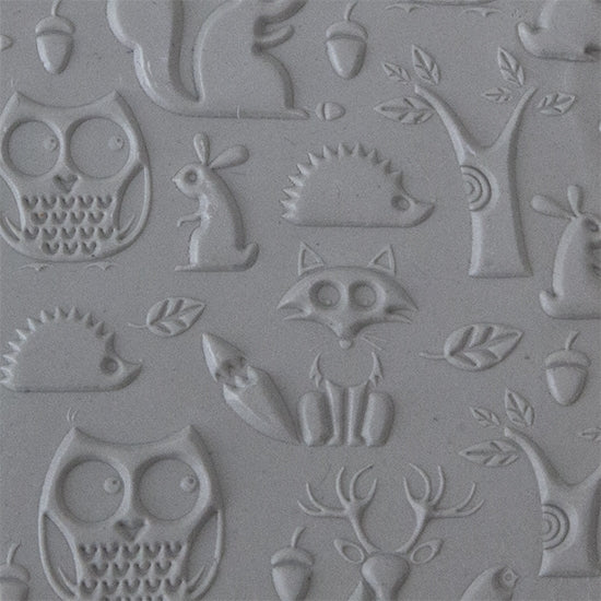 Texture Tile - Woodland Residents Embossed sample rolled into clay