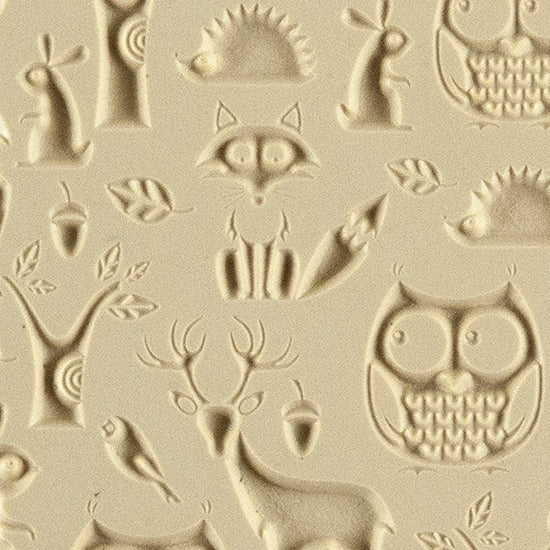 Texture Tile - Woodland Residents Embossed. Beige Texture Tiles are flexible, washable and can be used with any soft clay. Spritz with CoolSlip or dust on Dry Powder Release for stick-free impressions when using metal clay and polymer clay.