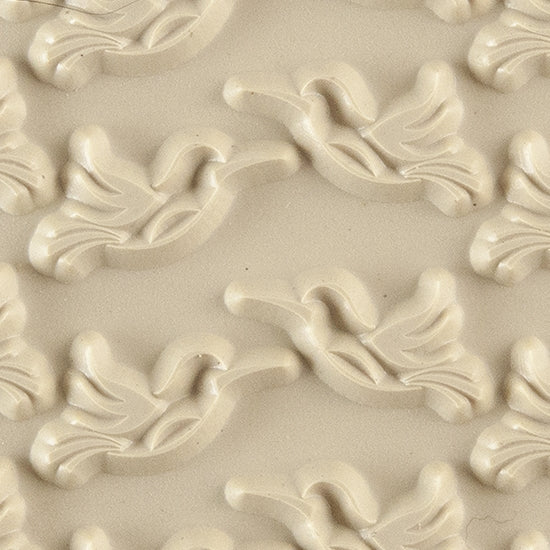 Texture Tile - Humming Around. Beige Texture Tiles are flexible, washable and can be used with any soft clay. Spritz with CoolSlip or dust on Dry Powder Release for stick-free impressions when using metal clay and polymer clay.