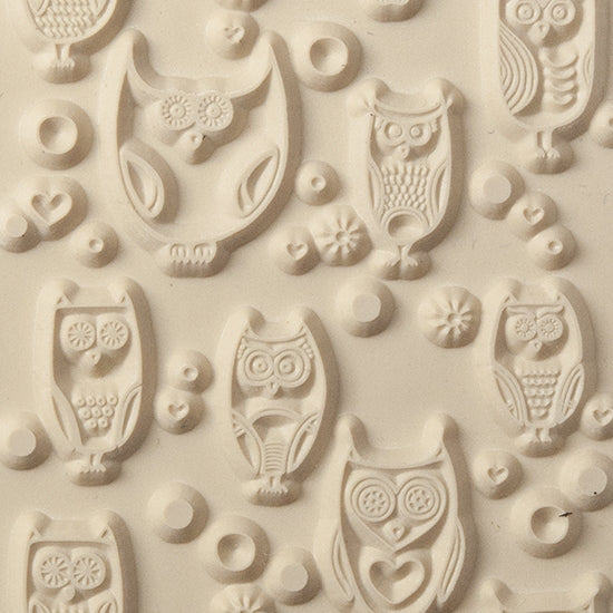 Texture Tile - Whose Hoo. Beige Texture Tiles are flexible, washable and can be used with any soft clay. Spritz with CoolSlip or dust on Dry Powder Release for stick-free impressions when using metal clay and polymer clay.