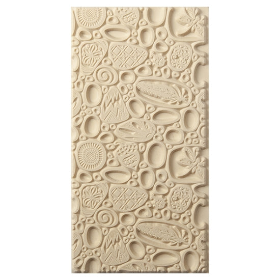 Texture Tile - Pebble Puzzle. Beige Texture Tiles are flexible, washable and can be used with any soft clay. Spritz with CoolSlip or dust on Dry Powder Release for stick-free impressions when using metal clay and polymer clay.