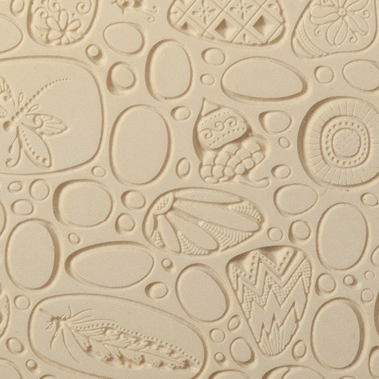 Texture Tile - Pebble Puzzle Fineline. Beige Texture Tiles are flexible, washable and can be used with any soft clay. Spritz with CoolSlip or dust on Dry Powder Release for stick-free impressions when using metal clay and polymer clay.