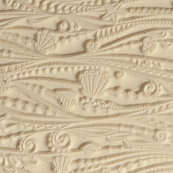 Texture Tile - Ocean Motion. Beige Texture Tiles are flexible, washable and can be used with any soft clay. Spritz with CoolSlip or dust on Dry Powder Release for stick-free impressions when using metal clay and polymer clay.