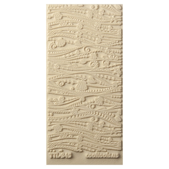 Texture Tile - Ocean Motion. Beige Texture Tiles are flexible, washable and can be used with any soft clay. Spritz with CoolSlip or dust on Dry Powder Release for stick-free impressions when using metal clay and polymer clay.