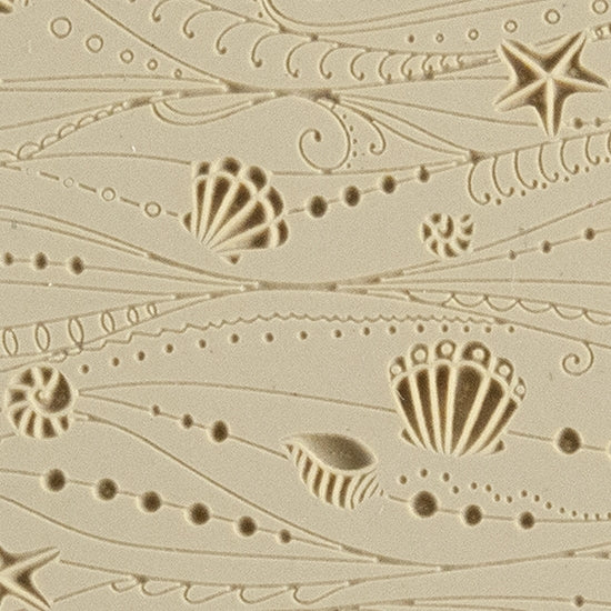 Texture Tile - Ocean Motion Fineline. Beige Texture Tiles are flexible, washable and can be used with any soft clay. Spritz with CoolSlip or dust on Dry Powder Release for stick-free impressions when using metal clay and polymer clay.