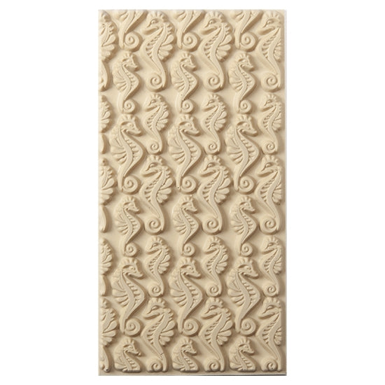 Texture Tile - Dragon of the Sea. Beige Texture Tiles are flexible, washable and can be used with any soft clay. Spritz with CoolSlip or dust on Dry Powder Release for stick-free impressions when using metal clay and polymer clay.