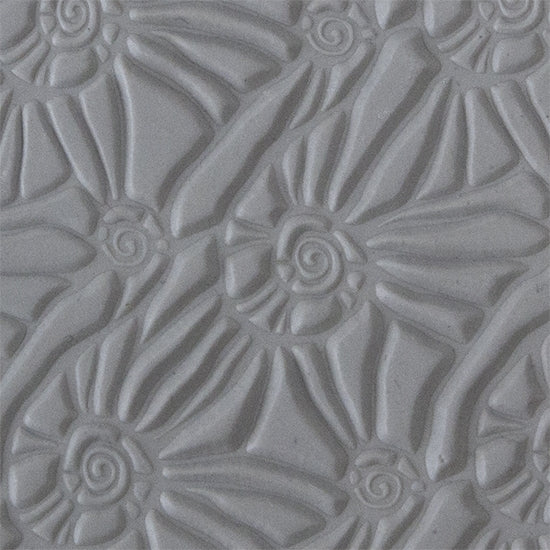 Texture Tile - Snail Parade sample rolled into clay