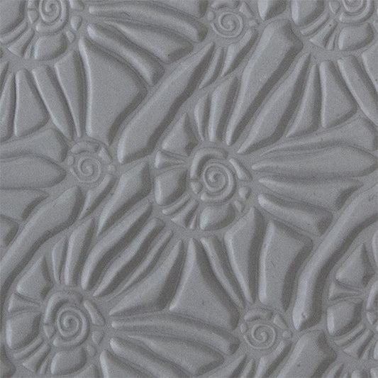 Texture Tile - Snail Parade sample rolled into clay